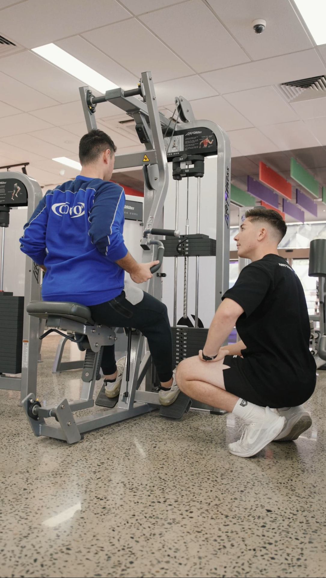 A Fortis coach coaching a client through a set